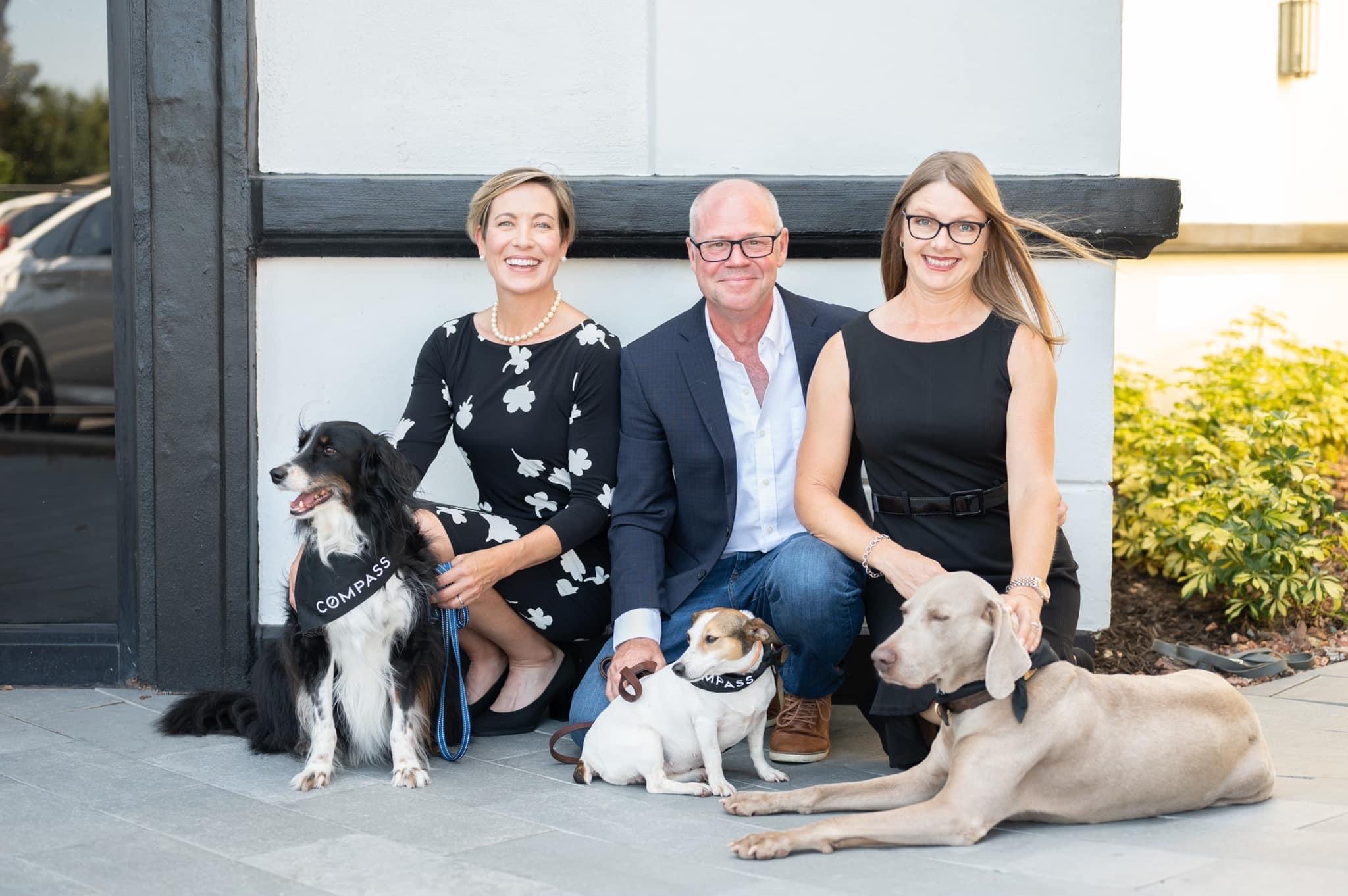Gary, Lucinda and Meghan pictured with their dogs.